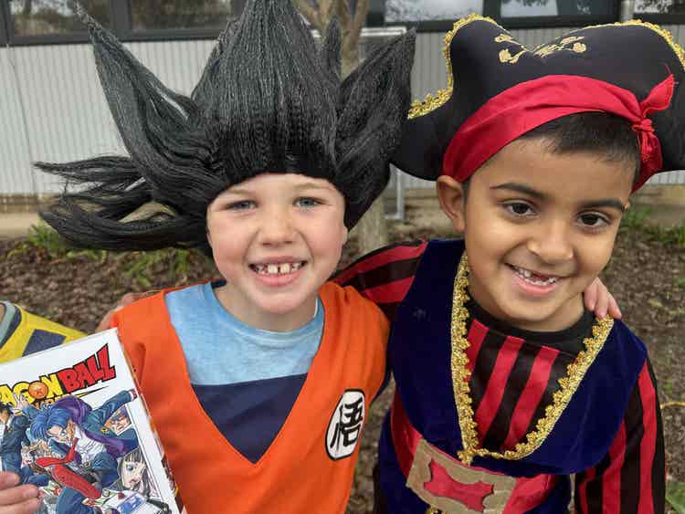 Two boys dressed up for book week.