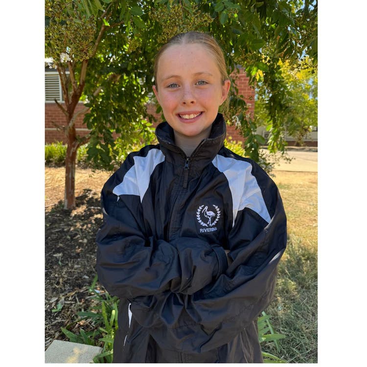 A student in their Riverina sporting jacket.