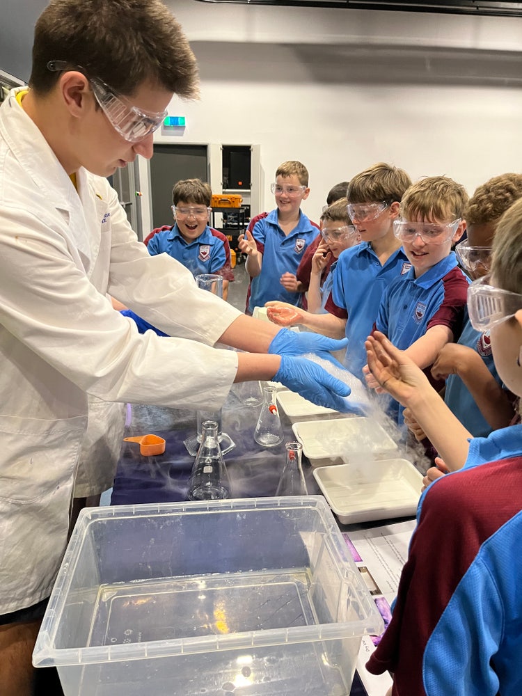 Stage 2 students at science experiment.